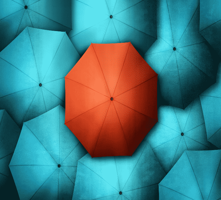 Digital Marketing Tips - Orange umbrella amongst blue umbrellas